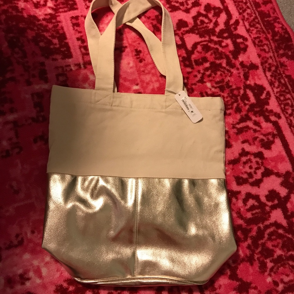 COPY - NWT Charming Charlie cream and gold tote bag